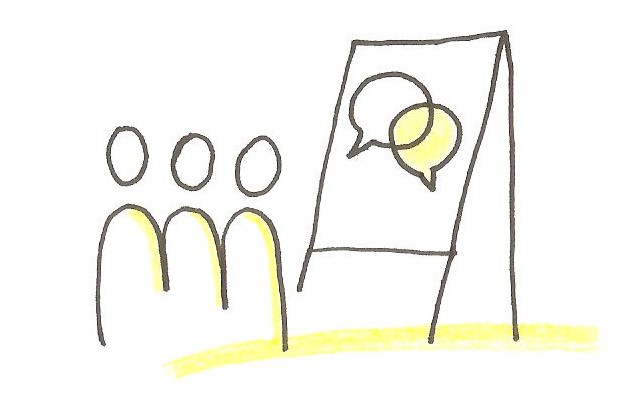 picto: groupe devant un paper board, symbole des formations